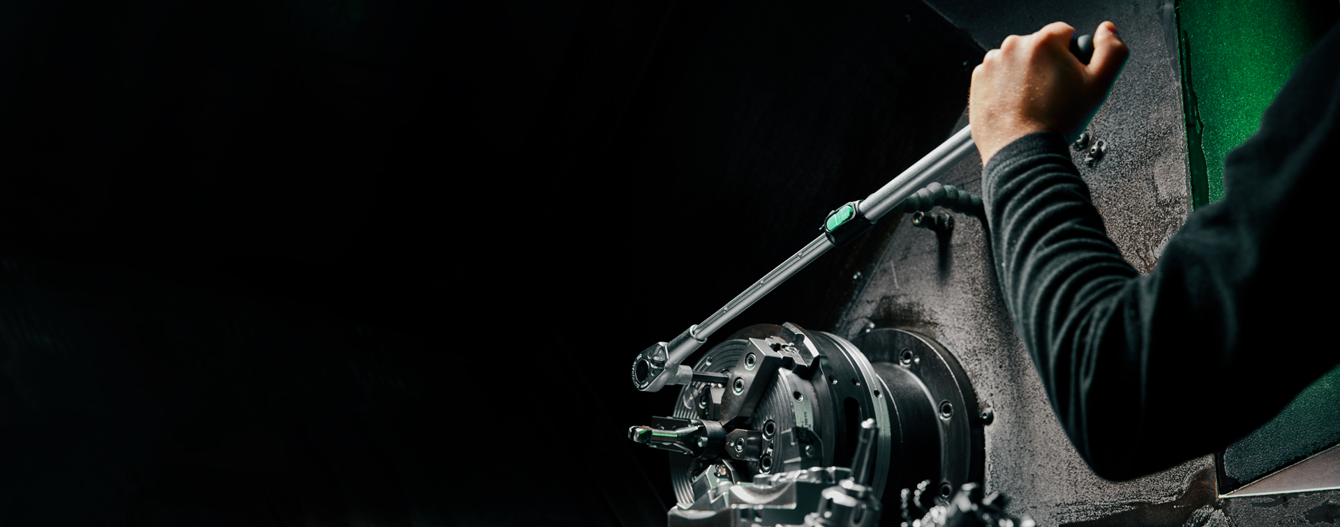 Man using torque wrench in an industrial application