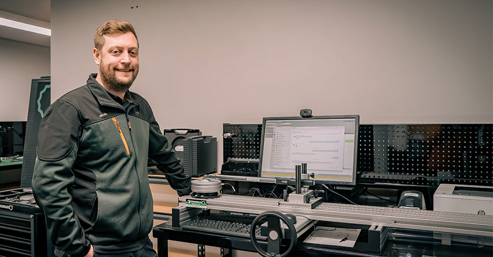 Technical support employee smiling into the camera
